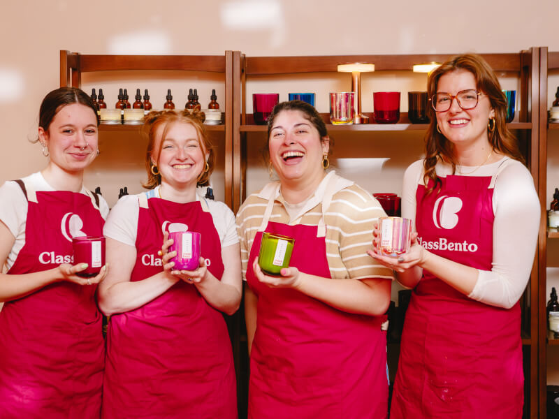 Women showing off their DIY candles